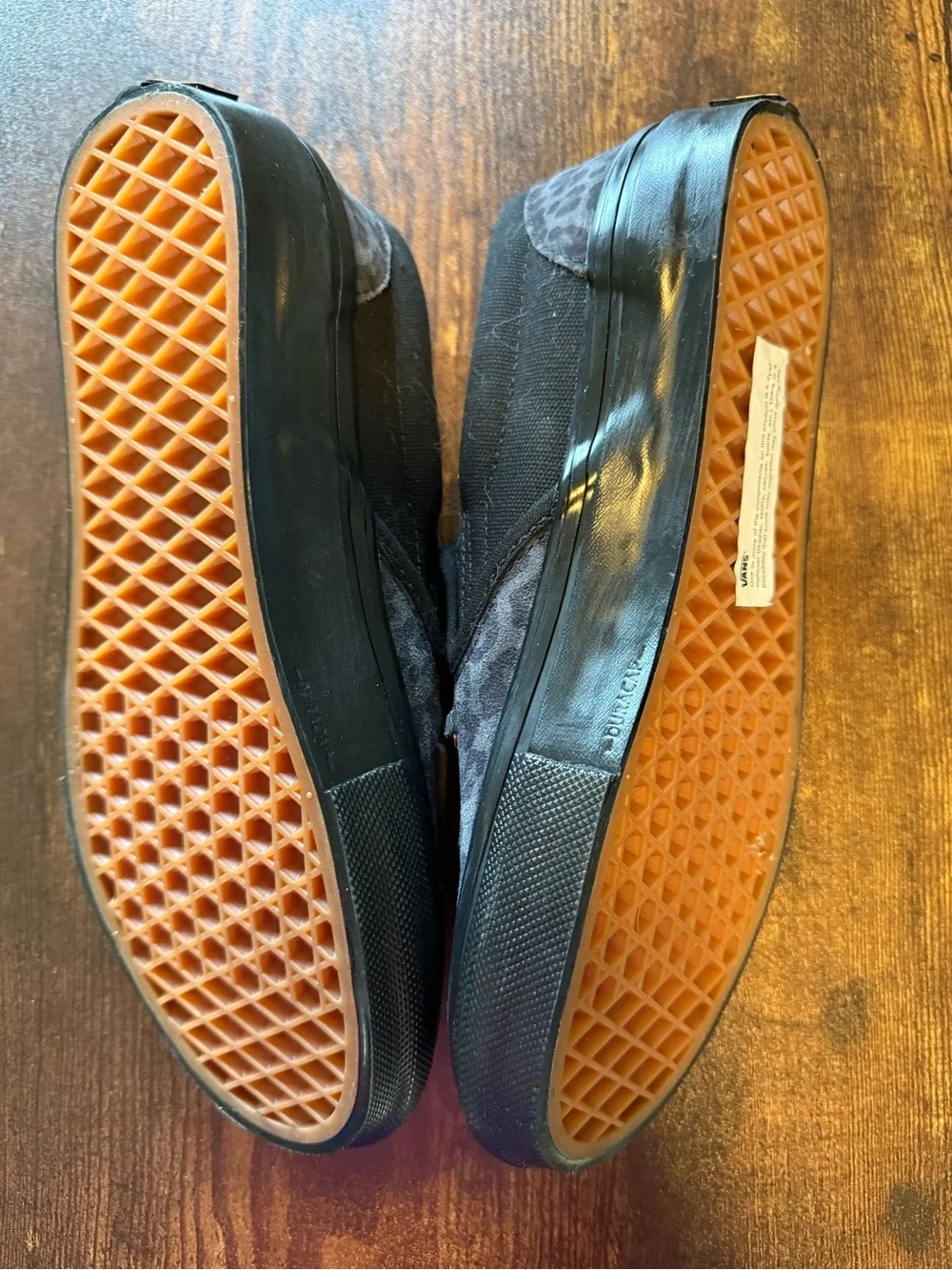 Vans Black Leopard Print Slip-On Loafers with Gold Accent